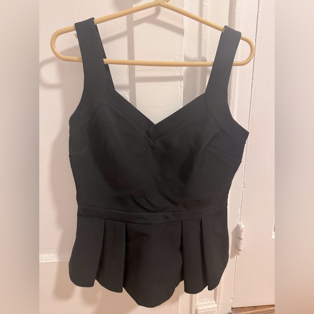 Brand new with tags! Banana Republic Limited Edition pleated peplum black top!